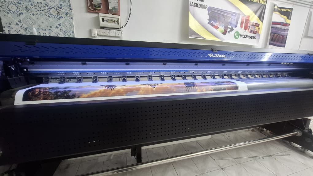 Banner printing in progress at BannerKita